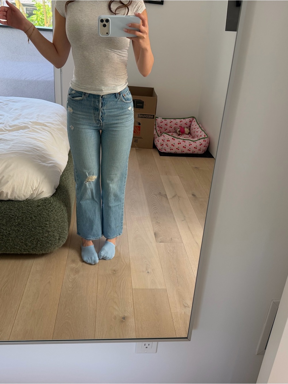 Levi's Light Blue Straight Leg Jeans with Subtle Distress